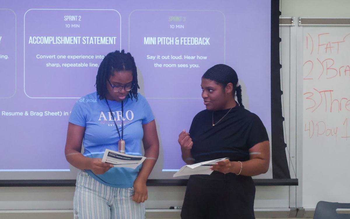 A student practicing a presentation during a BFA workshop